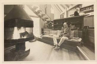 Phil Dike on Couch Near Fireplace (Dike Cabin, Cambria Pines)